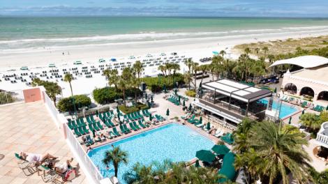 Lounging on the luxurious pool deck of The Don Cesar in St. Pete Beach, Florida Lounging on the luxurious pool deck of The Don Cesar in St. Pete Beach, Florida
